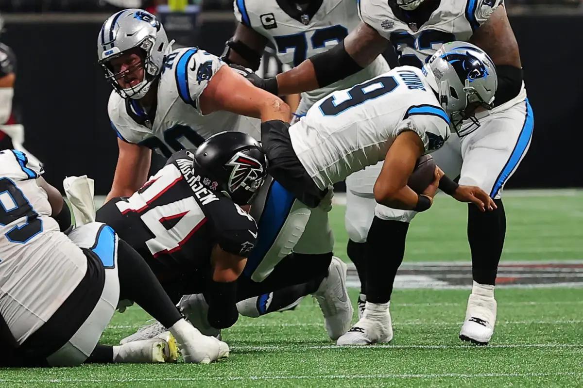 Falcons linebacker Troy Andersen sacks Carolina Panthers quarterback Bryce Young in Week 1, 2023.